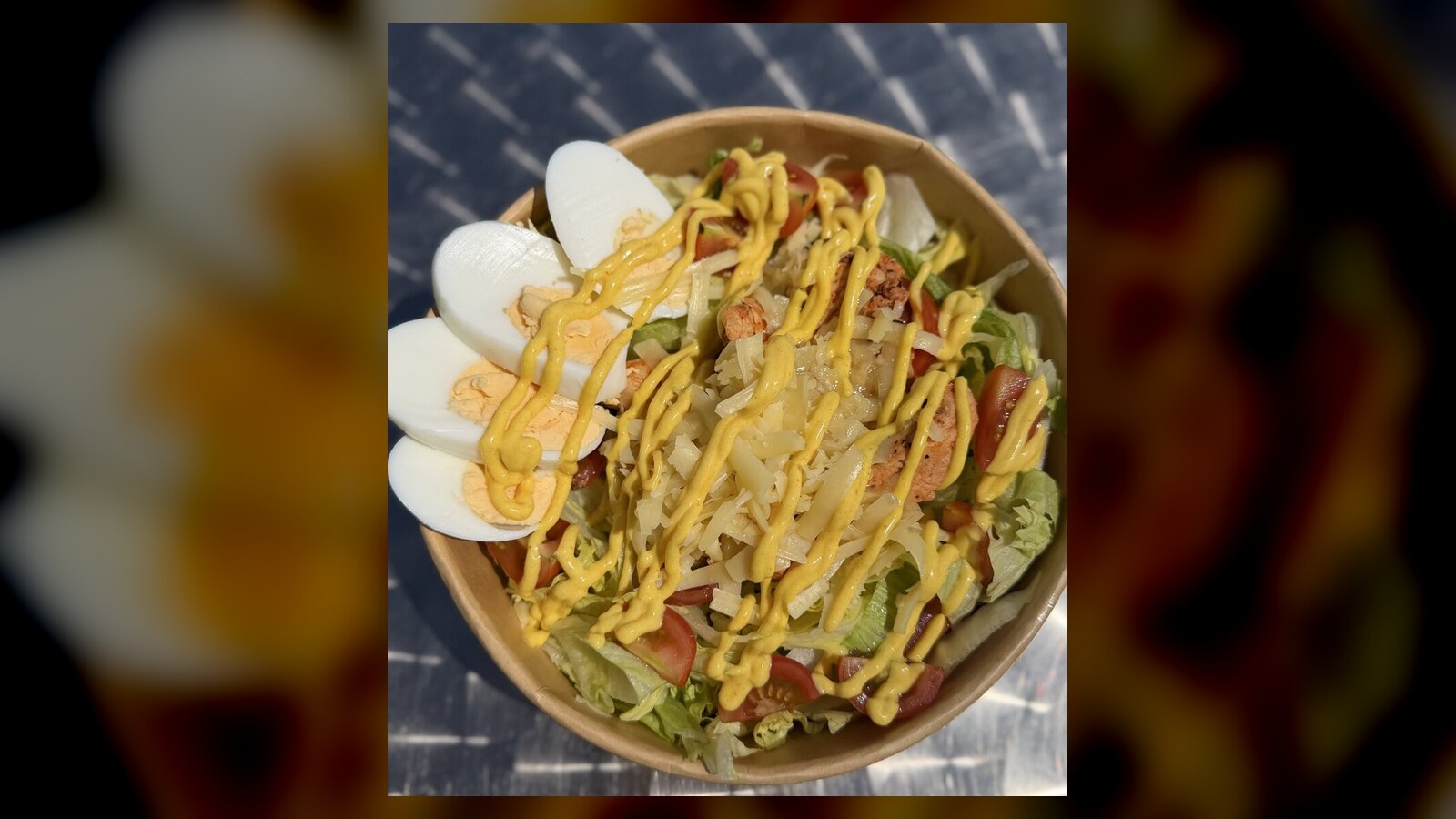 Smoked chicken protein bowl with egg and salad